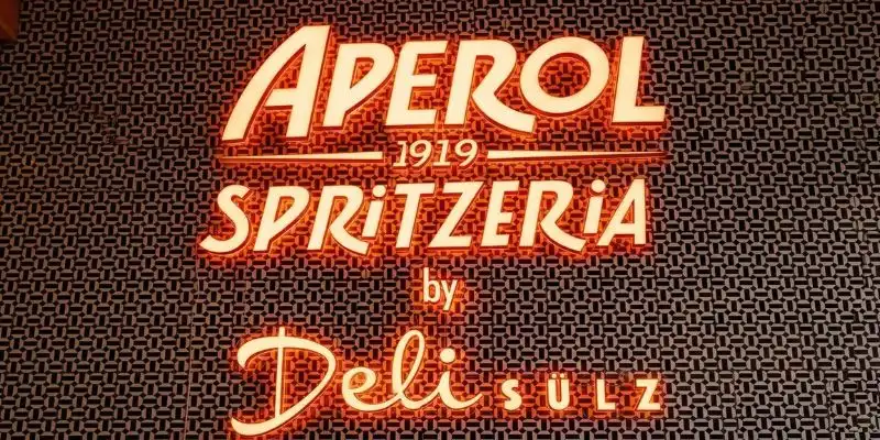 Aperol Spritzeria 3D channel letters front-lit custom illuminated signage retail
